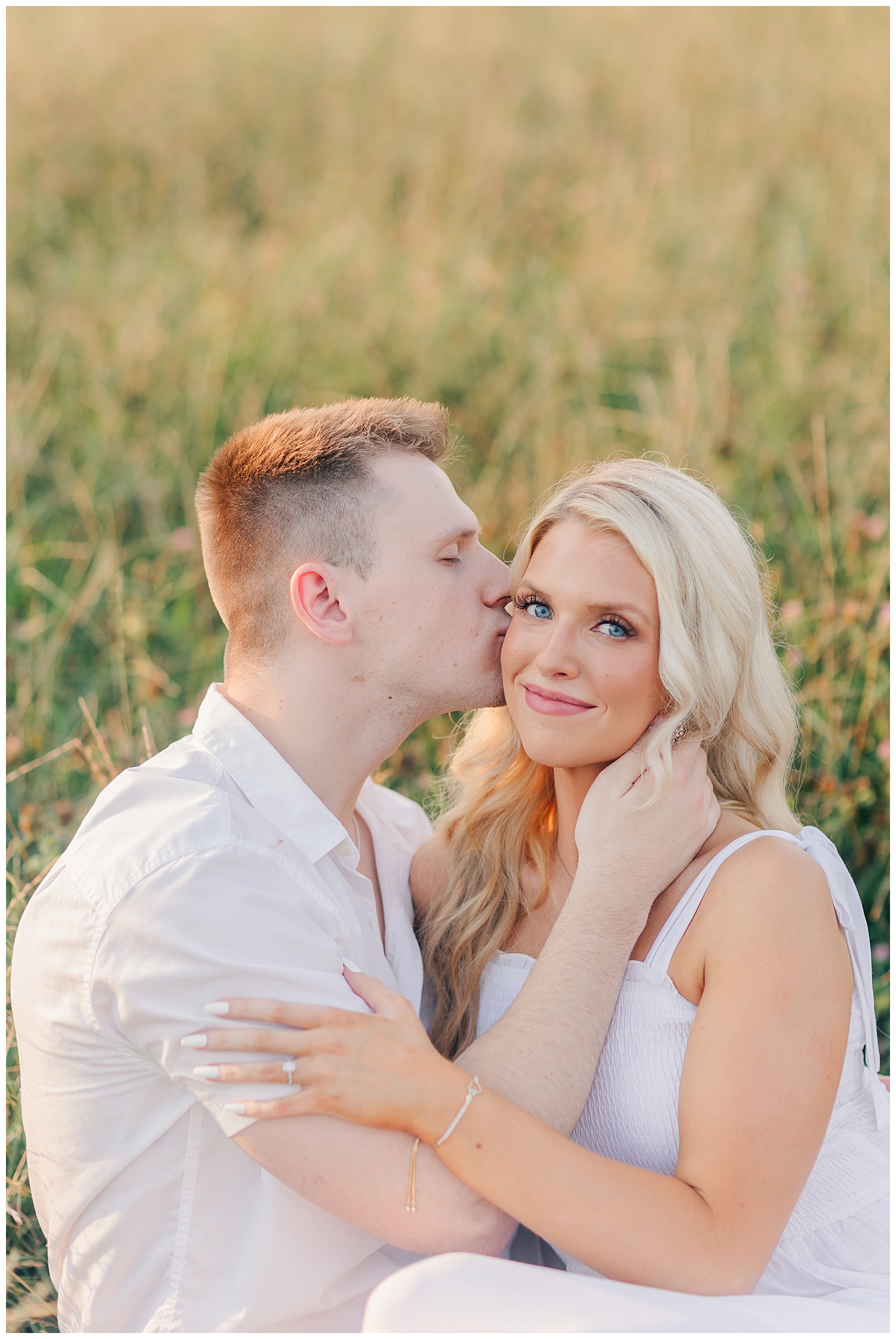 Sweet moments between a couple at their classic picnic engagement session in West Virginia