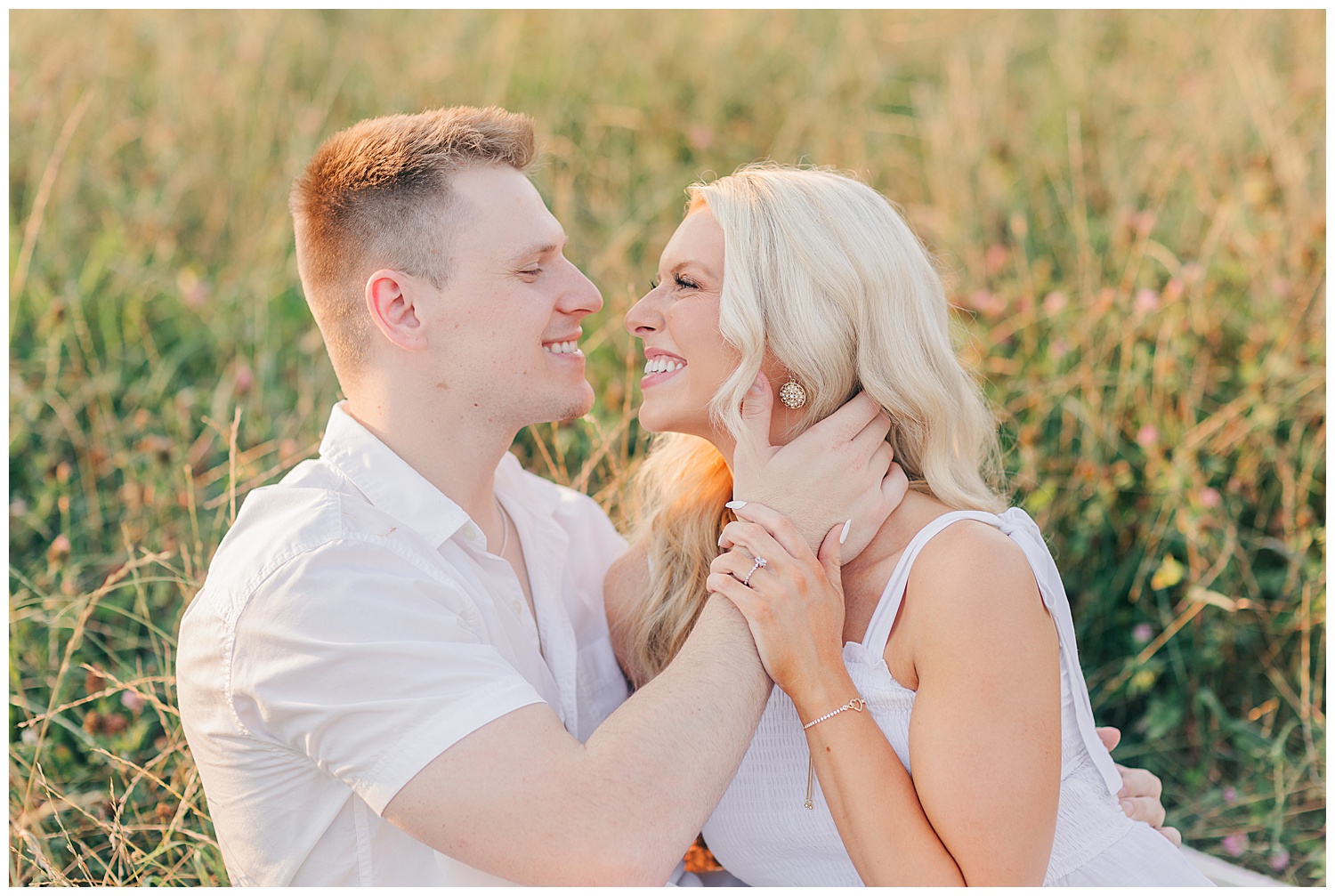 Genuine laughter between a couple at their classic picnic engagement session in West Virginia