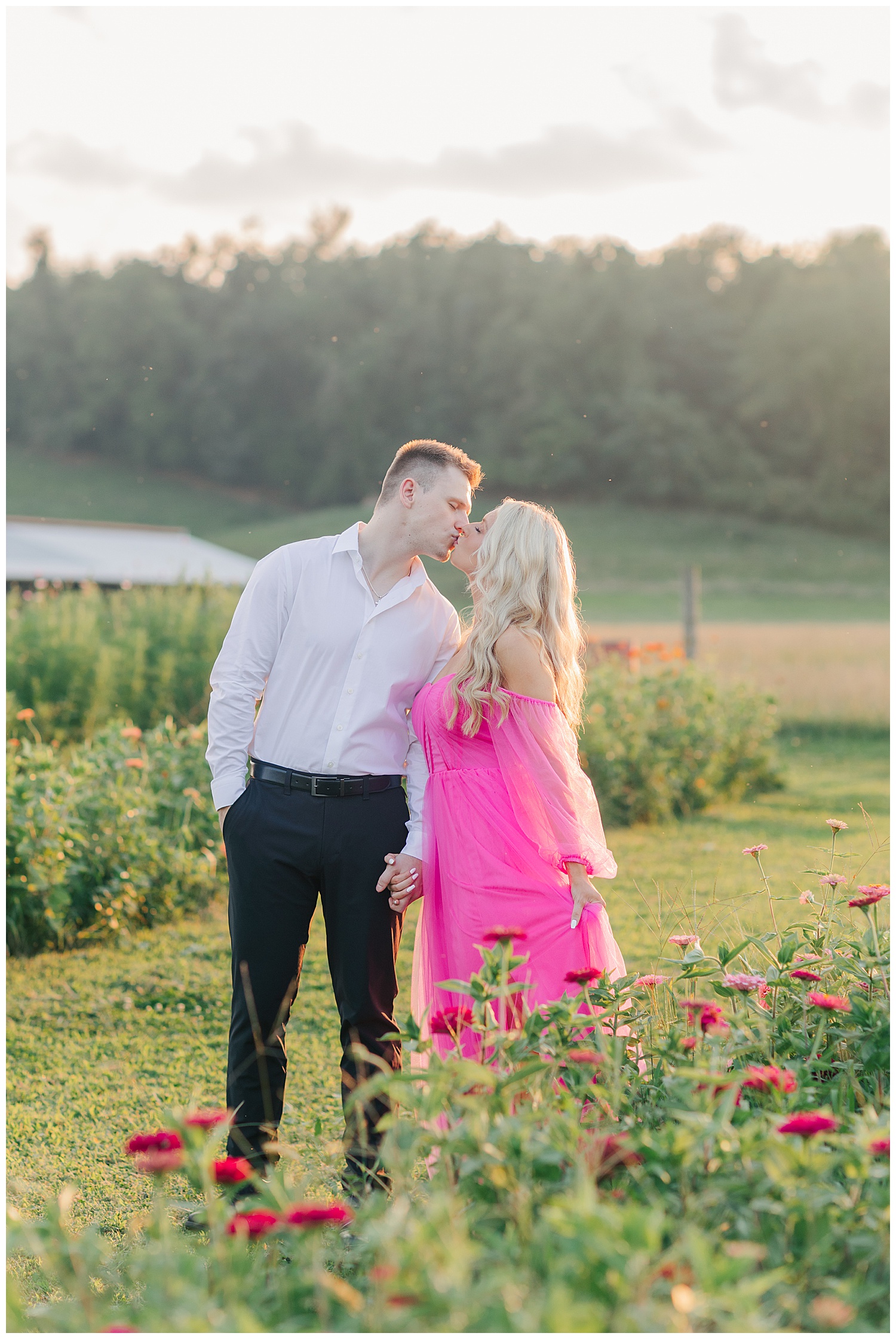 Sweet moments between a couple at their classic picnic engagement session in West Virginia