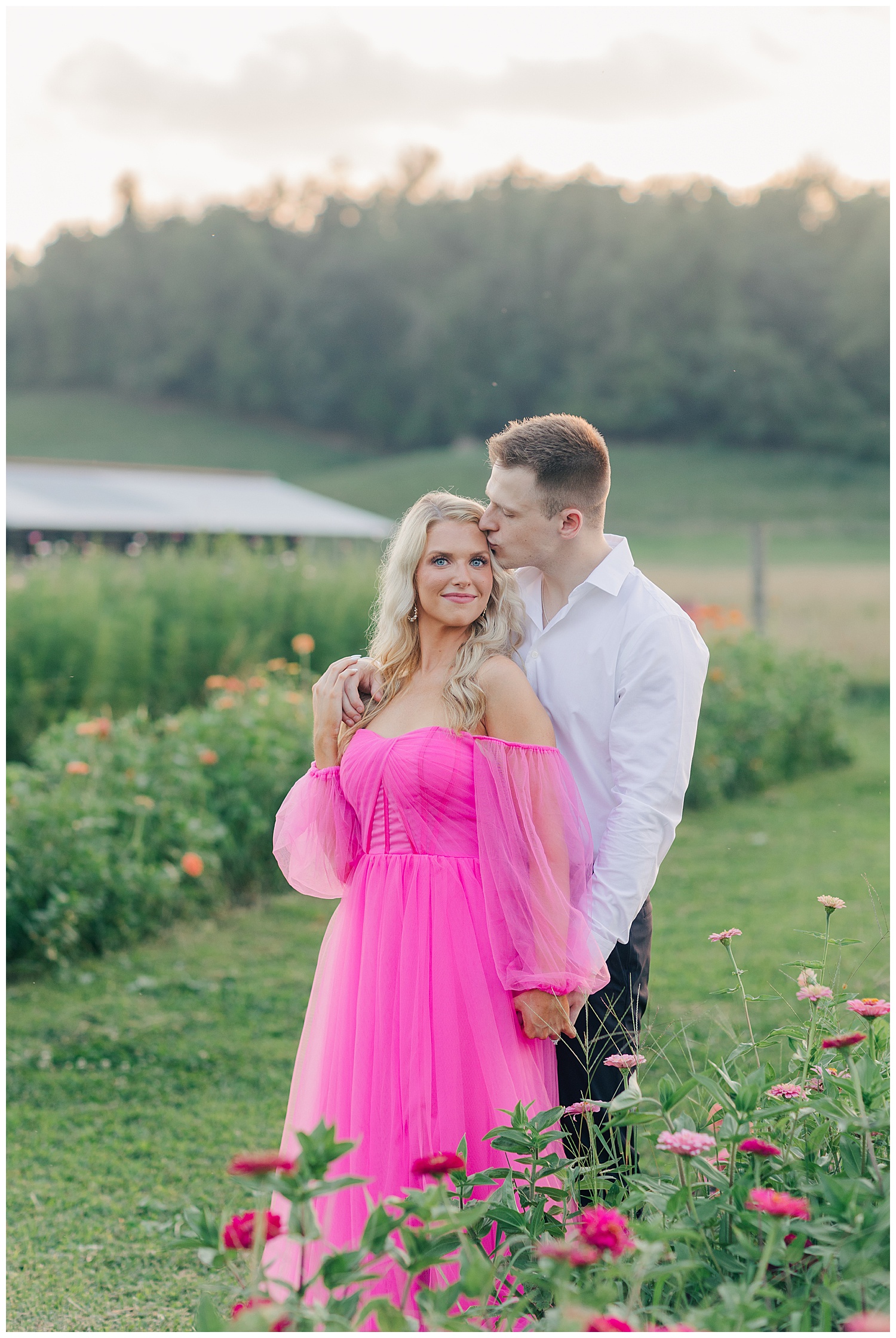 Sweet moments between a couple at their classic picnic engagement session in West Virginia