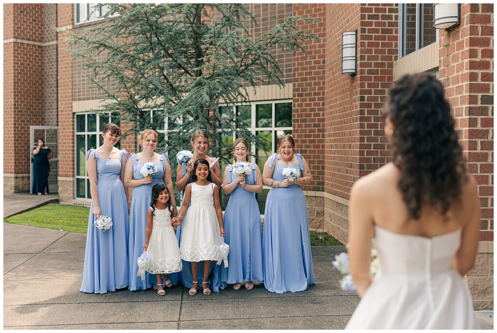 Bridesmaids and flower girls reacting emotionally to bride’s first look — Morgantown wedding day