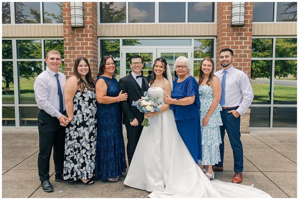 Bride with immediate family posing outside wedding venue in Morgantown WV — Zoe Evans Photography