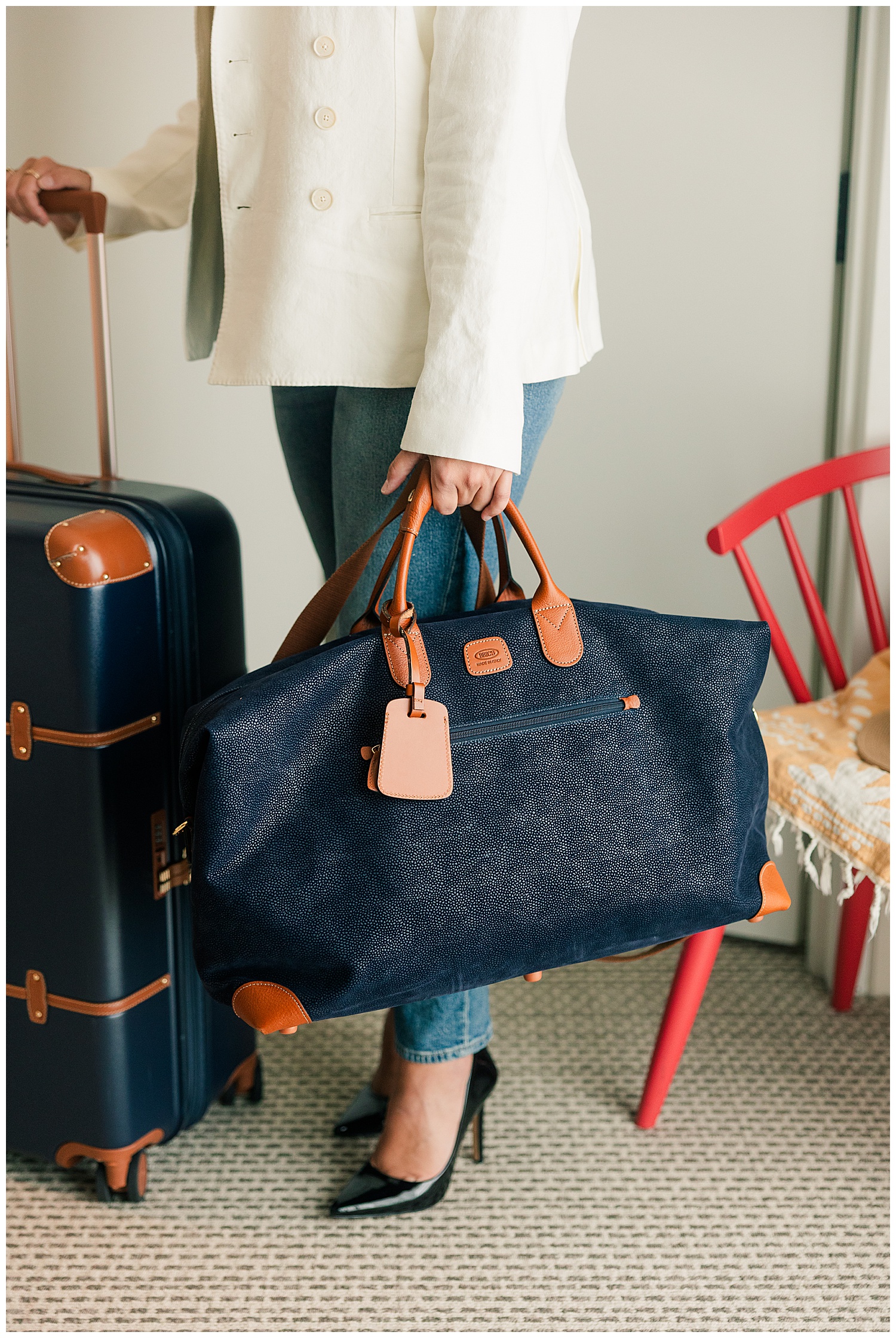 Detail brand photo of luxury travel bag and suitcase, highlighting Lauren’s elevated travel planning style for clients, photographed by Zoe Evans in Newport, RI.