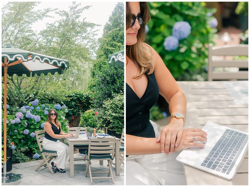 Relaxed outdoor lifestyle photo of travel advisor Lauren during her branding session with Zoe Evans, taken at a coastal New England café setting. Close-up of travel advisor Lauren working on her laptop, featuring feminine details and New England charm, captured by Zoe Evans Photography for her brand session.