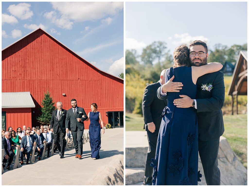 Wedding guests arriving at Red Barn Inn for Raquel and David’s celebration, with vibrant red barn backdrop | candid wedding photography by Zoe Evans