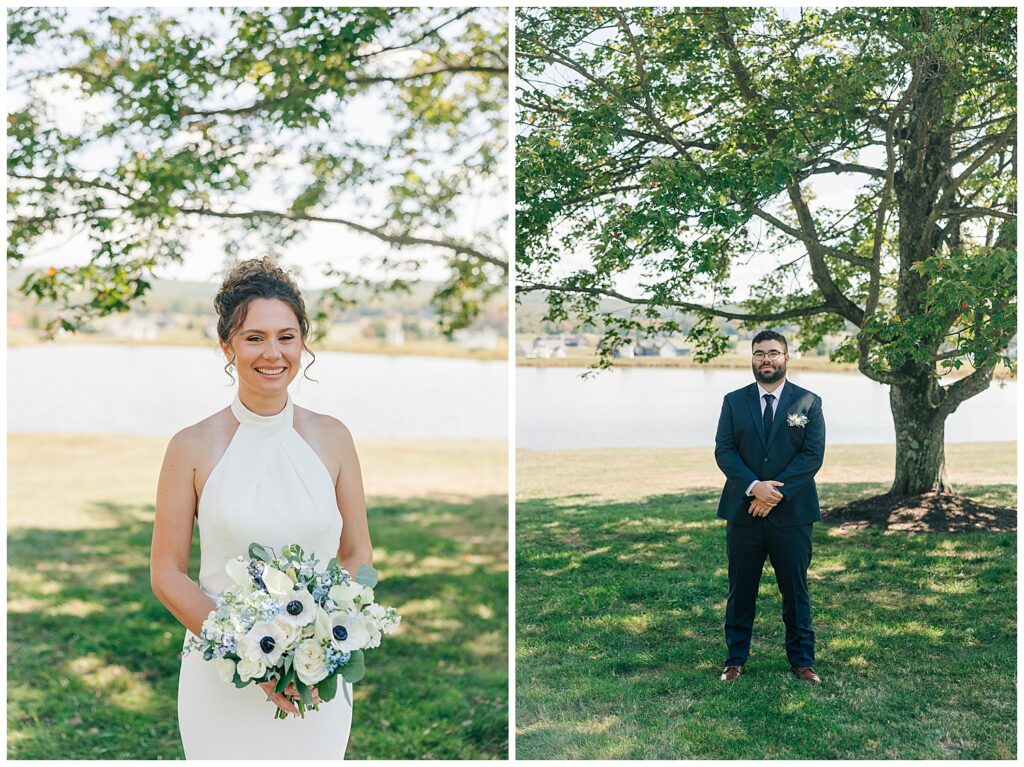 Bride in sleek halter gown holding white and green bouquet, standing under a tree with waterfront view