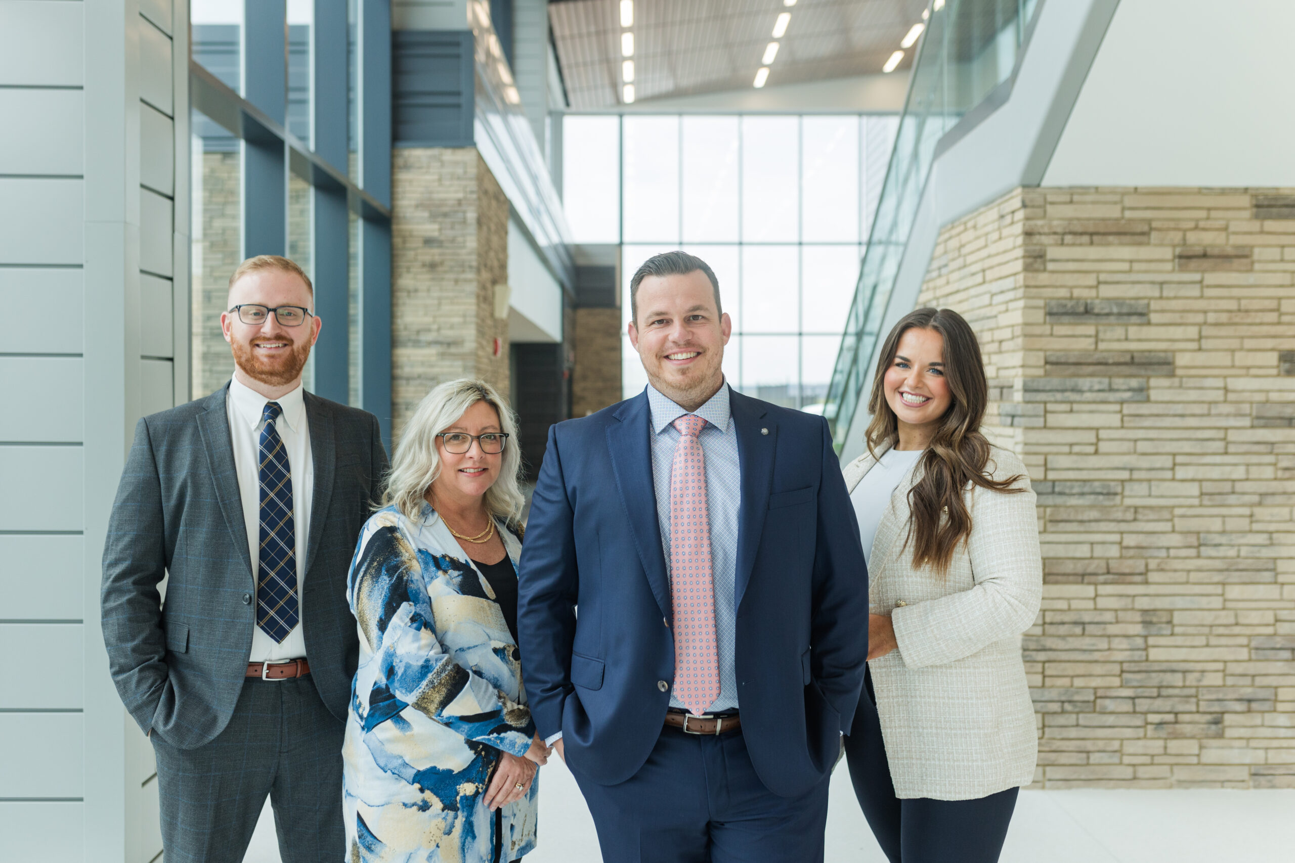 Group of professionals during a modern branding photoshoot at a corporate office – brand session by Zoe Evans Photography in Virginia. Book your session now.
