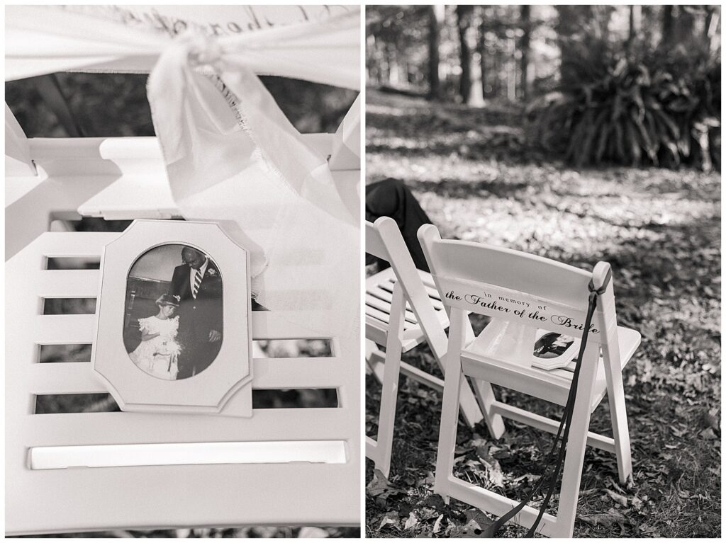 Close-up of memorial chair honoring lost loved ones with framed black-and-white photos and white ribbons tied to the backrest.