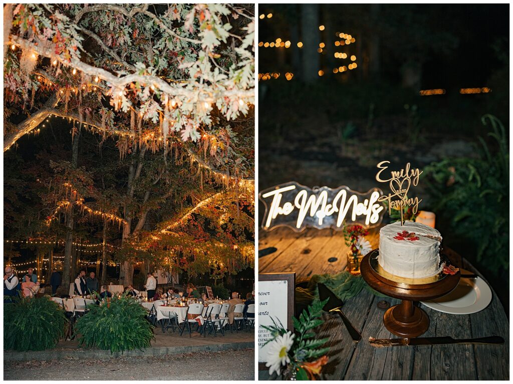 A white wedding cake sits on a wooden cake stand beneath glowing string lights and a neon “The McNairs” sign.