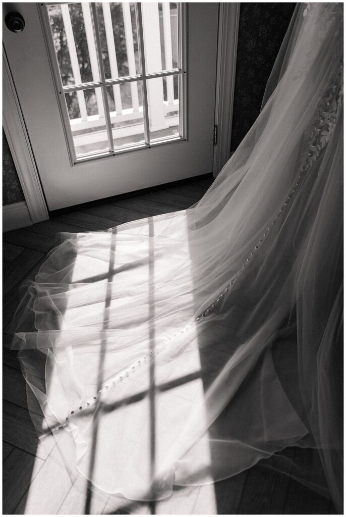 Bridal veil illuminated by soft morning light at Ellis House Maryland, captured by Zoe Evans Photography.