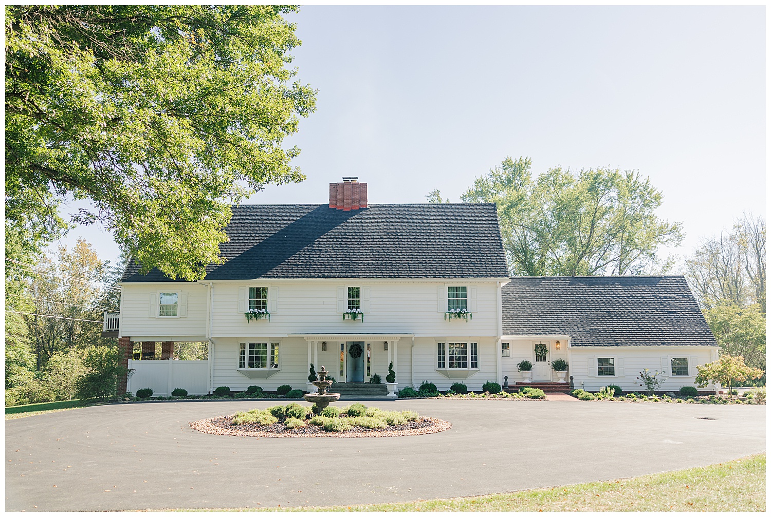 Wide exterior view of Ellis House in Fairmont West Virginia, a timeless and elegant wedding venue, photographed by Zoe Evans Photography.