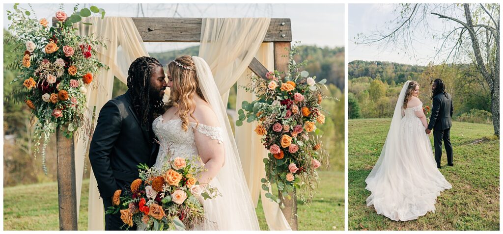Bride and groom kissing under floral ceremony arch with rustic backdrop in West Virginia
