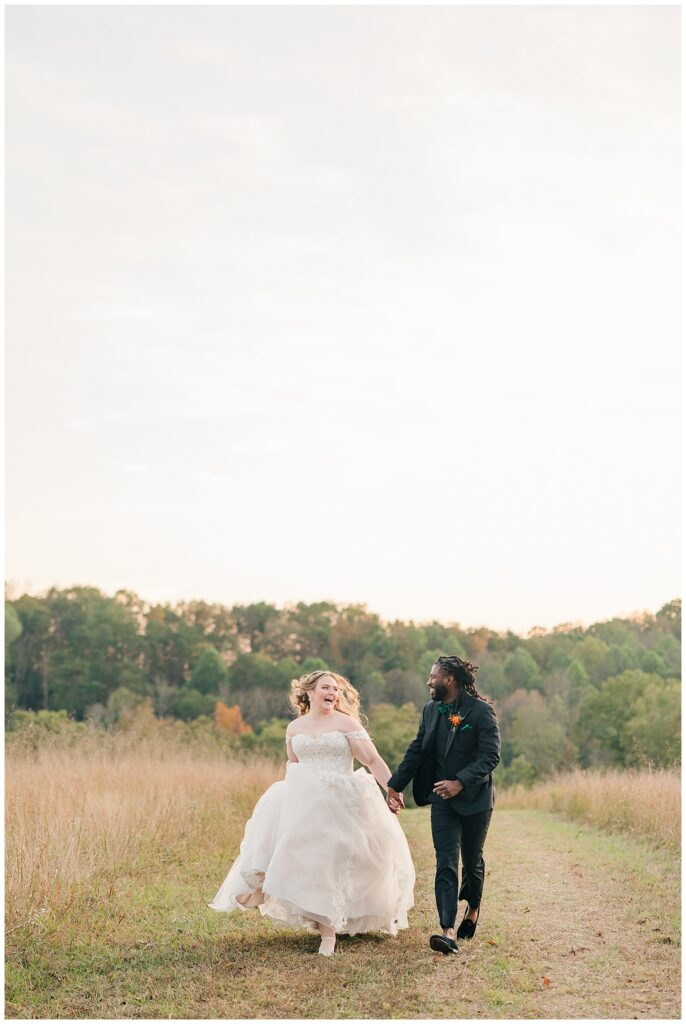 Elegant fall bridal bouquet with orange, peach, and ivory blooms at Palomino Pastures wedding