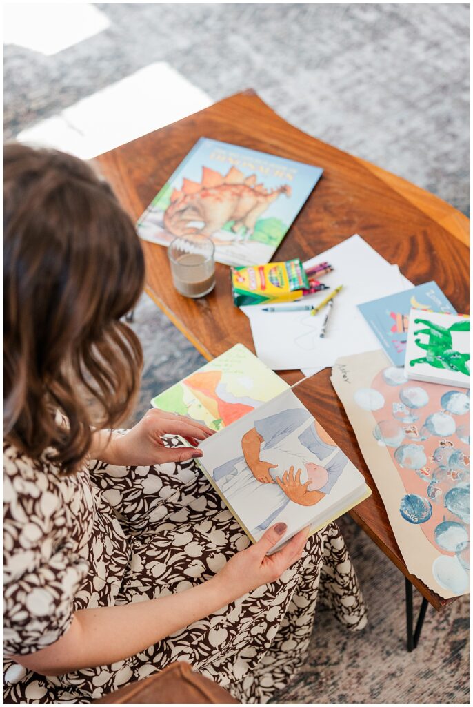 Creative brand photo of Ashleigh painting abstract watercolor art at her workspace during her branding session.