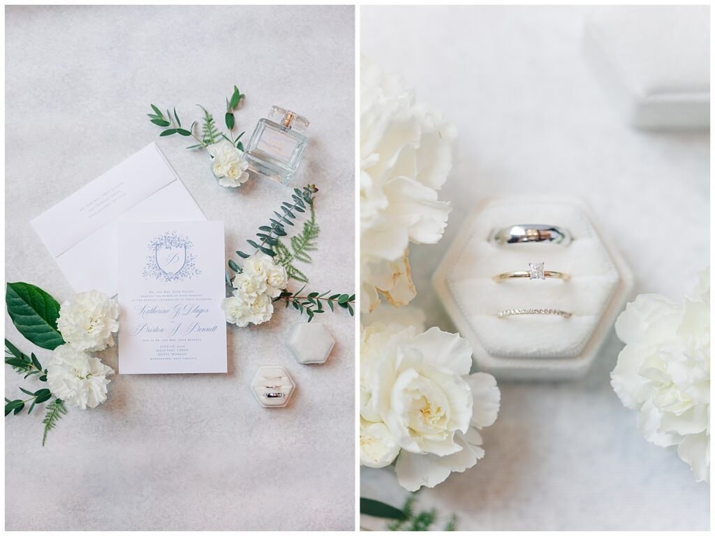 Elegant flat lay of wedding invitation suite with floral accents and ivory blooms at Hotel Morgan. Close-up of three wedding bands in a white ring box surrounded by fresh white flowers.