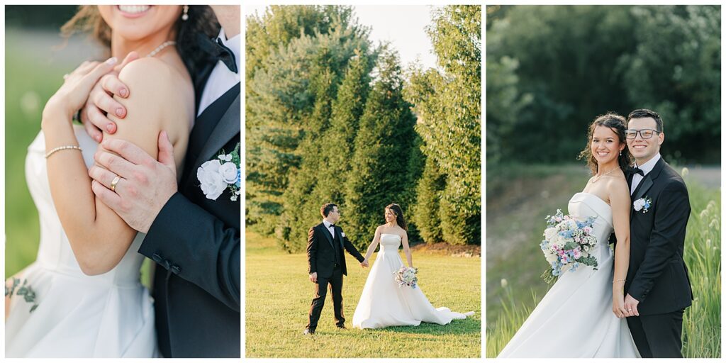 Bride and groom holding hands and walking across a sunlit grassy field surrounded by tall pines