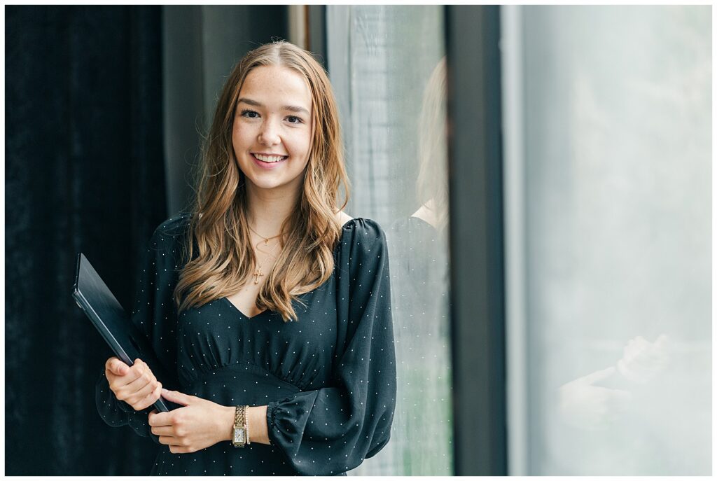 Natural light branding headshot of a smiling Brittany Ann’s Events team member at The Onyx Room West Virginia in Morgantown WV