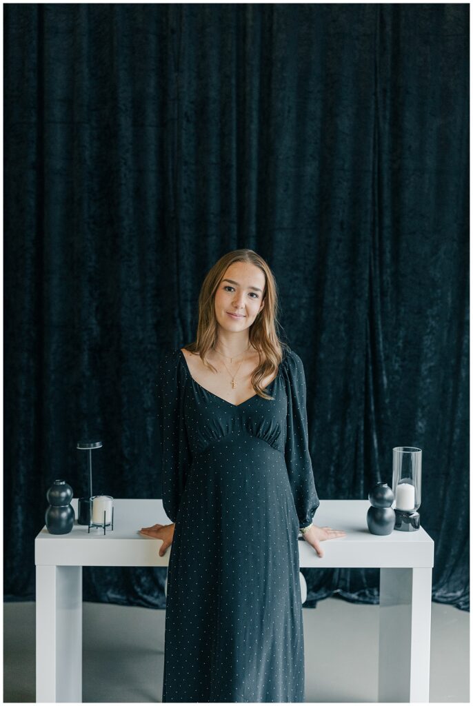 Professional branding portrait of a woman in a black dress at The Onyx Room West Virginia for Brittany Ann’s Events team photos in Morgantown WV