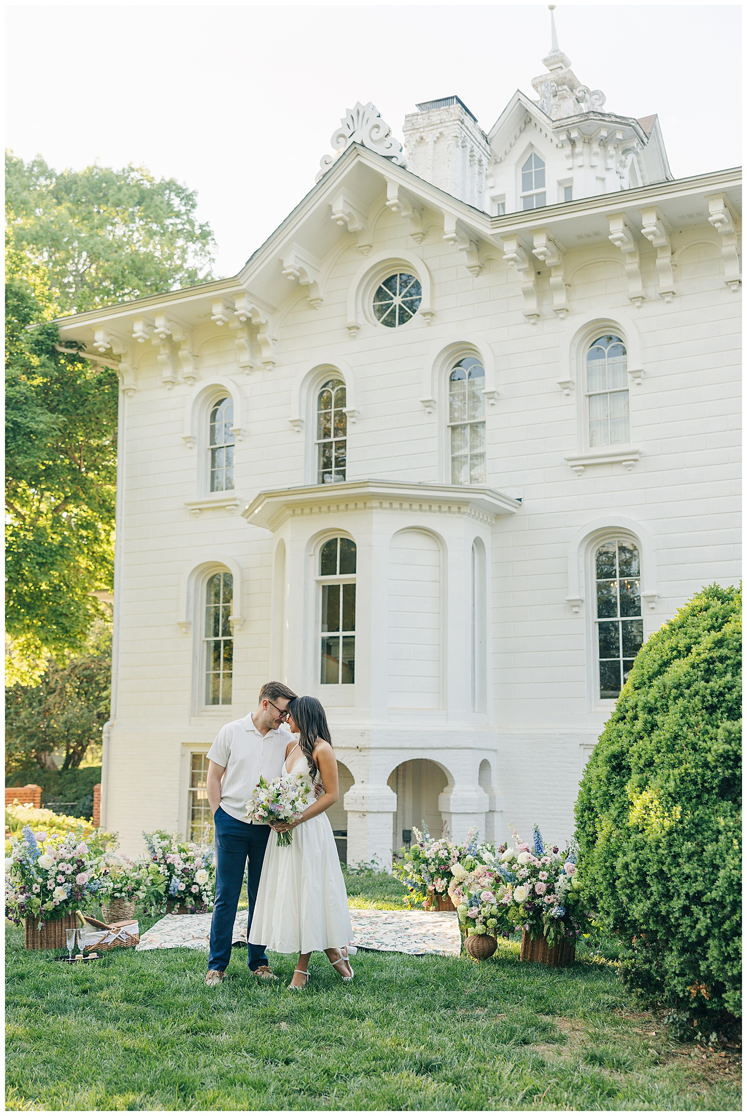 Elegant Virginia engagement session at Mayhurst Estate featuring historic architecture, dreamy evening light, and romantic floral wedding inspiration